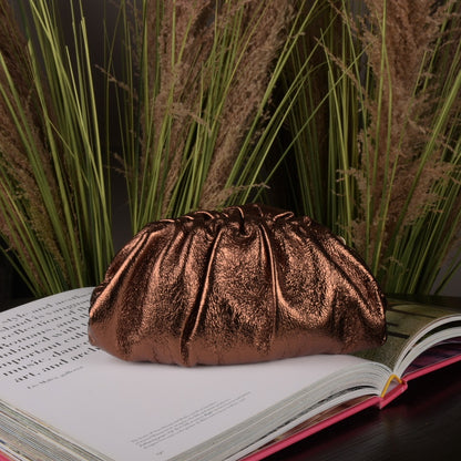 Small roundish-brown metallic leather clutch